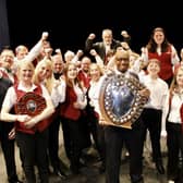 Newbiggin Brass Band celebrate their regional win.