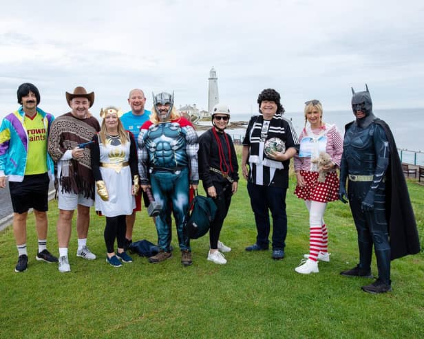 Regional managers from Co-op Funeralcare prepare to start their 7km charity walk from St Mary’s lighthouse in Whitley Bay. (Photo by John Millard/UNP)