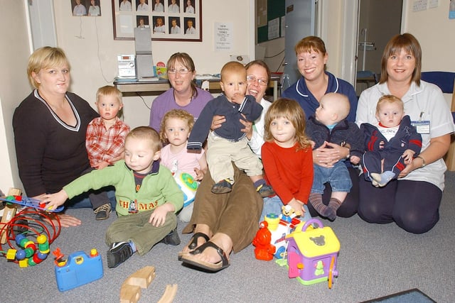 RAINBOW DAY NURSERY HANDING OVER MONEY TO HILLCREST MATERNITY UNIT, RAISED FROM SPONSORED TODDLE