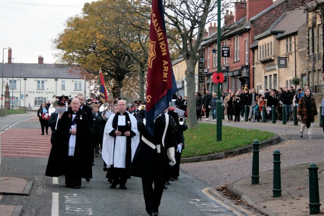The Remembrance service parade makes its way along Front Street, in Bedlington.