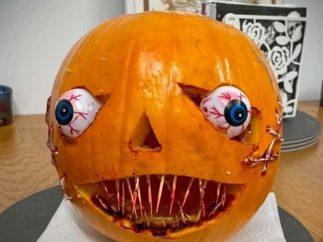 A pumpkin by Leo, aged 9. Top work Leo!