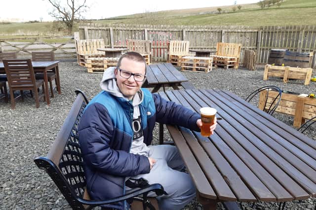 Frank Lyford enjoying a pint at the Alnwick Brewery's beer garden.