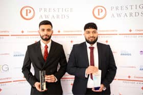 Suleman Khan, left, and Akbar Khan with the North England Prestige Awards accolade for Magna Tandoori.