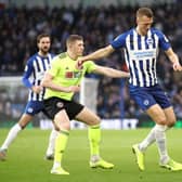 Dan Burn in action for Brighton and Hove Albion. (Photo by Bryn Lennon/Getty Images)