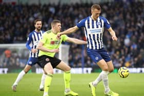 Dan Burn in action for Brighton and Hove Albion. (Photo by Bryn Lennon/Getty Images)