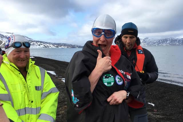 A delighted Jane Hardy after her 1km swim in the freezing waters of Antarctica.