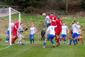 Rothbury FC's Adam Bains climbs to head in his second goal against North Shields Athletic. Picture: Susan Aynsley
