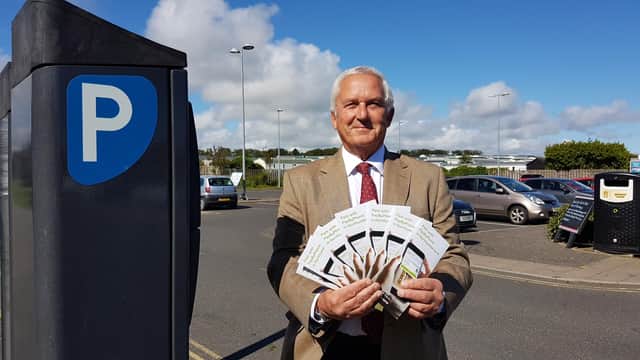 Coun Glen Sanderson at the launch of the new PayByPhone system.