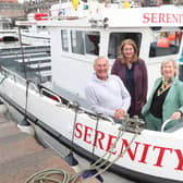 Andrew-Douglas, owner of Serenity Farne Island Boat Tours-in-Seahouses with Sarah-Green, NGI chief executive and Fiona Pollard, chair of VisitEngland. Picture: Steve Brock Photography