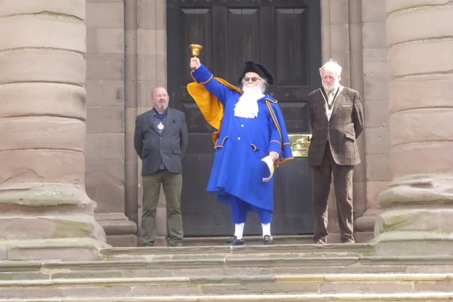 Town crier Jolly Roger, watched by the Mayor and Sheriff, read a royal proclamation.