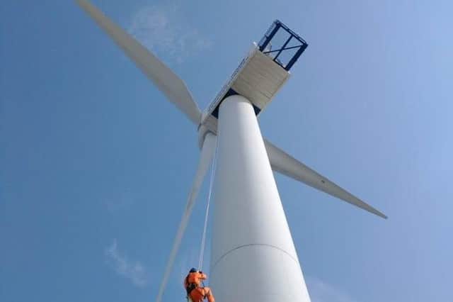 A charity abseil is being held at a wind turbine at the Port of Blyth in aid of the Bright Red charity.