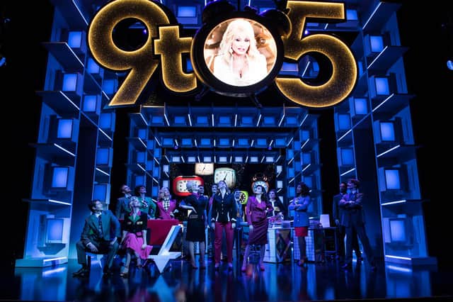 Dolly Parton appears on the big screen in 9 to 5 The Musical. Photo by Craig Sugden.
