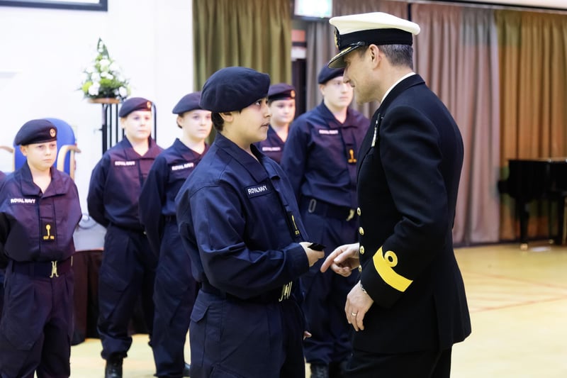 Commodore Tom Knowles promoted three local sea cadets ahead of the ceremony.