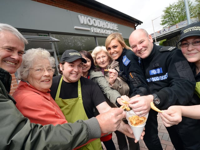 From left, Coun. David Smith, Betty Hill, Philip Michael, Jeanette Samways, Sheila Frankland, PCSO Stevie Willetts, PC Ian Dickson and Anna Michael got ready to serve up supper at the Harold Harvey Hall in 2013