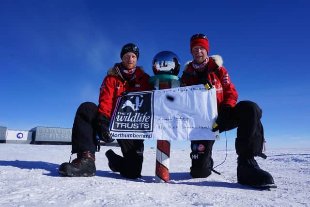 Prince Harry and Northumberland Wildlife Trust president Conrad Dickinson about to raise the NWT flag at the South Pole in December 2013. Picture: Walking with the Wounded