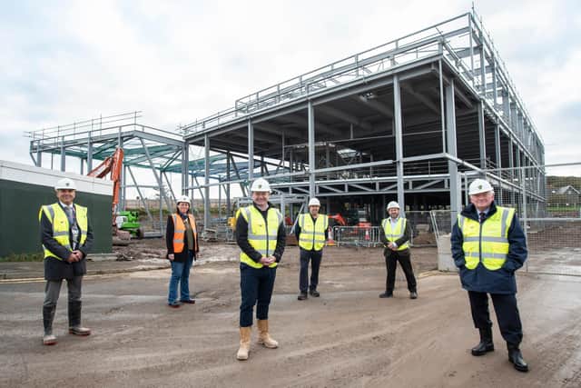 Work is progressing on a new leisure centre in Berwick. Pictured front row, left to right: Stephen Holmes, service director, Adult Social Care, Northumberland County Council; David Thompson, regional director, Tolentt; Jeff Watson, cabinet member with responsibility for Healthy Lives, Northumberland County Council. Back row: Councillor Georgina Hill, Steve Temple, Swan Centre manager and Ken Dunbar, managing director of Advance.