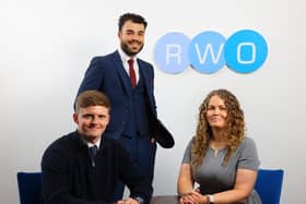 RWO has hired Callum Webster (left), Paul Florescu (standing) and Lisa Simpson (right). (Photo by RWO)