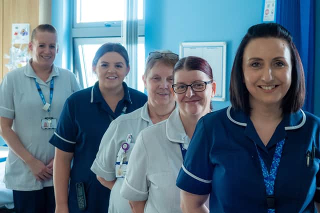 Ward manager Donna Robinson (right) with other staff on the new procedures unit.