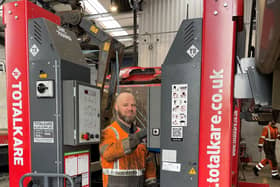 Recently qualified technician Craig Summers, from Ashington, operates a new column lift. (Photo by Heathline Commercials)