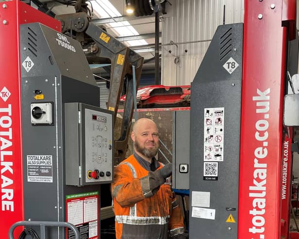 Recently qualified technician Craig Summers, from Ashington, operates a new column lift. (Photo by Heathline Commercials)