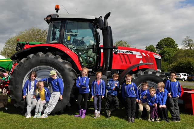 St Michael's C E First School, Alnwick, pupils learn about farming machinery at Children's Countryside Day.