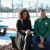 Jamilah Hassan of Banks Group and Keith Whisson, chairperson of Blyth Spartans Juniors FC, test out the new benches.