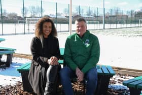 Jamilah Hassan of Banks Group and Keith Whisson, chairperson of Blyth Spartans Juniors FC, test out the new benches.
