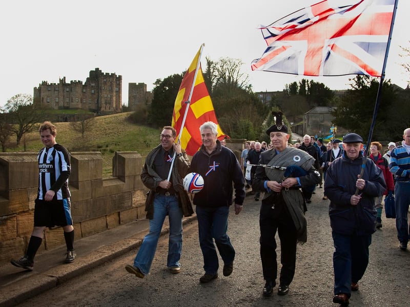 The match ball is carried across the Lion Bridge ahead of the 2012 event.