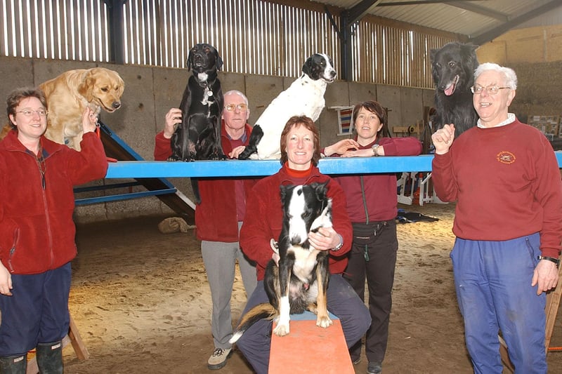Alnwick Dog Training Club members with equipment given by Alnwick Round Table.