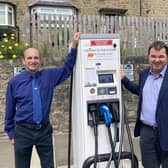 Coun John Riddle, cabinet member for improving our roads and highways, and Guy Opperman MP at a county council EV charge point.