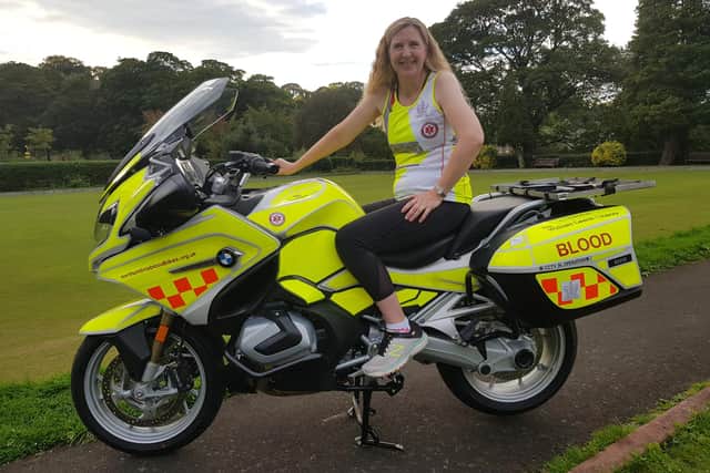 Coun Alison Byard pictured sitting on the new ‘Morpeth’ Northumbria Blood Bike.