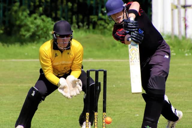 Ben O'Brien of Ashington Cricket Club hits a shot on his way to 41 against Newcastle. Picture: Steve Graham Sports Photos