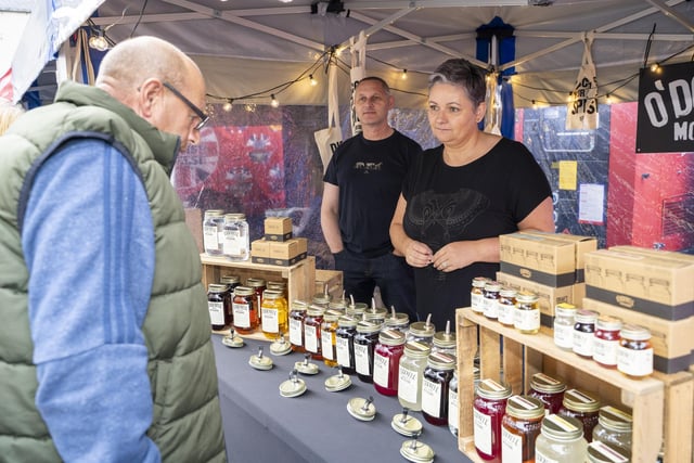 Graeme and Louise Woodfine selling their O'Donnell Moonshine.