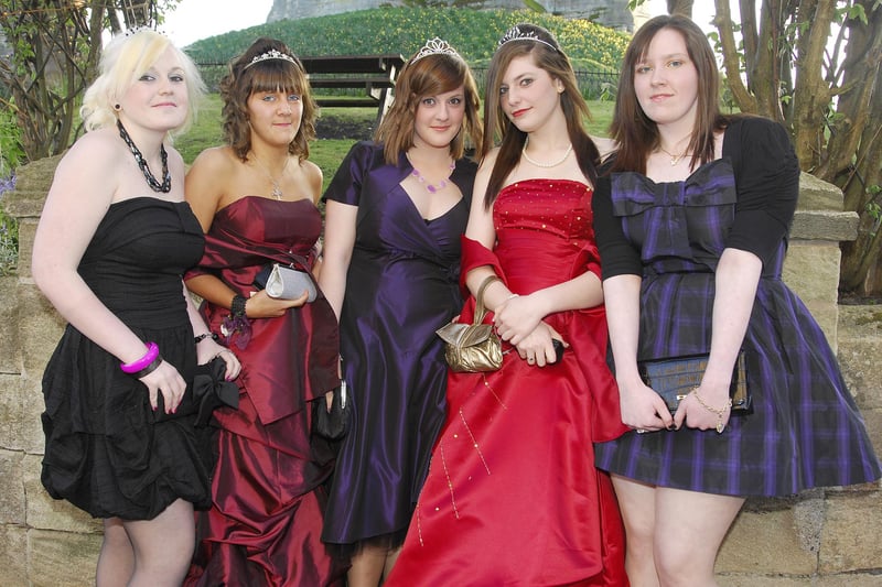 Some of the lasses line up in front of Warkworth Castle before 2009 Coquet High School Prom.
