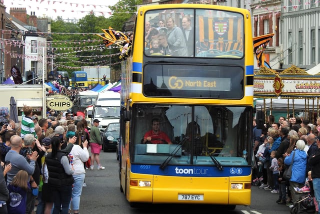 The parade included an open top bus carrying Morpeth Town FC representatives.