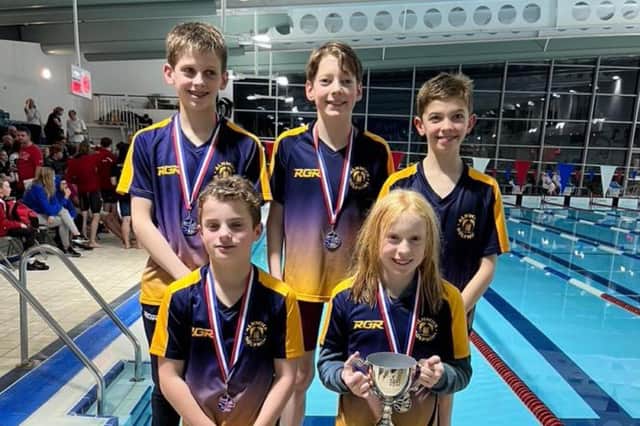 Alnwick Dolphins' swimmers with their trophies and medals at the Durham City Medley Challenge.