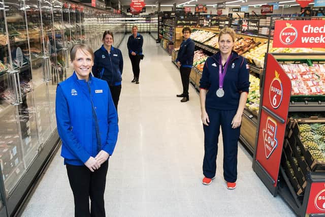 Assistant manager Wendy Smith and some of her team at the all new Aldi store in Bedlington joined by Team GB athlete Gemma Gibbons.
Picture by John Millard/UNP.