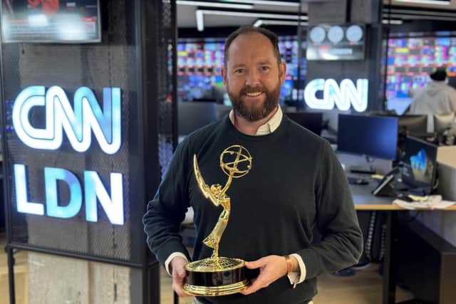 James Frater with his Emmy award at the CNN London office.