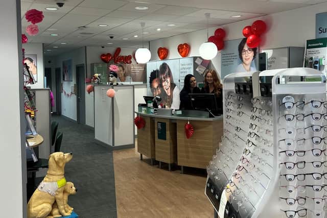 The Specsavers Morpeth team get the store ready for its Valentine’s-themed fundraiser.
