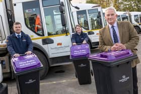 Stephen Wardle, neighbourhood services divisional manager; Wendy Phail, senior waste management officer; and Cloun Glen Sanderson with the new wheeled bins which will be used in the glass recycling trial.