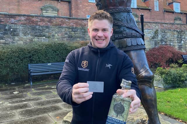 Andy Petherick, chief executive of Pilgrim Spirit Company which makes Hotspur Gin, by the Harry Hotpsur statue in Alnwick.