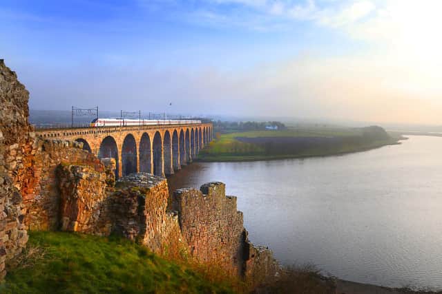 The Azuma crossing the Royal Border Bridge image that is part of the LNER 2021 Calendar. Image by CREST PHOTOGRAPHY.