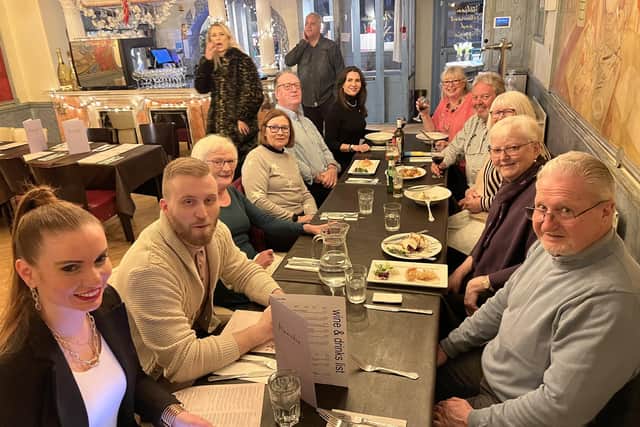 Members of the Morpeth for Ukraine group enjoying a meal together.