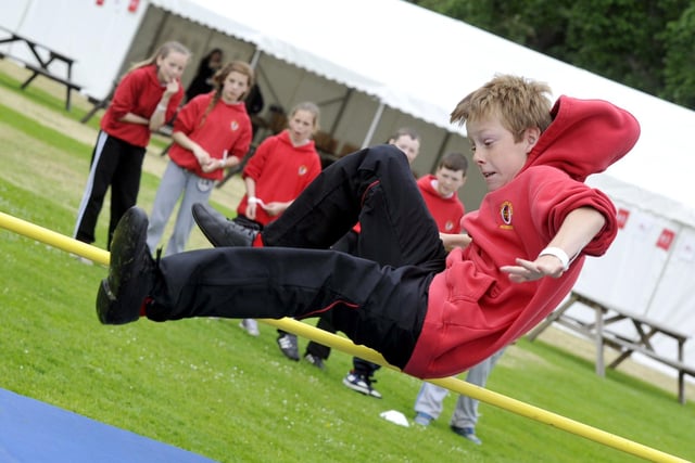 A Dukes Middle School pupil takes on the High Jump.