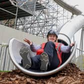 English Heritage volunteer Alex Morrell tests the new slide descending down the side of Belsay Hall, which is undergoing major renovation work as part of the multi-million pound Belsay Awakes project: North News & Pictures.