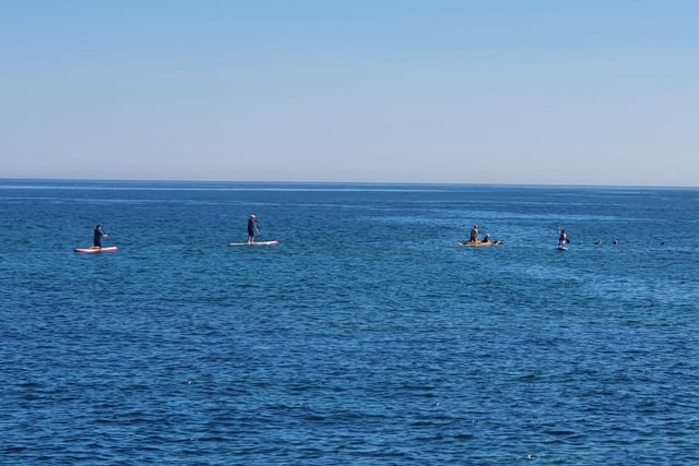 Paddleboarders off the coast of Amble.