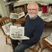 Former journalist Vince Gledhill with some of his old newspaper cuttings.