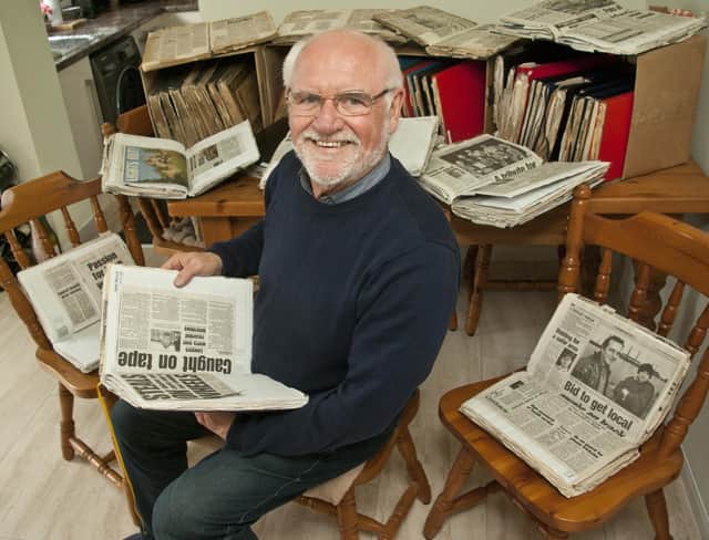 Former journalist Vince Gledhill with some of his old newspaper cuttings.