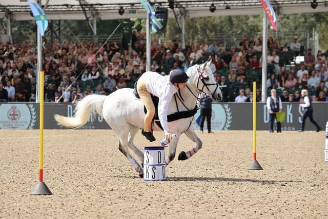 Alice Randall competing at the Royal Windsor Horse Show.