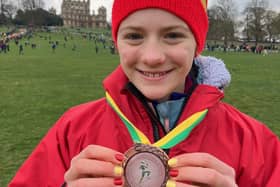 Emilia Waugh with the team bronze medal she helped the North East U13 girls team win. Picture: Joe Waugh